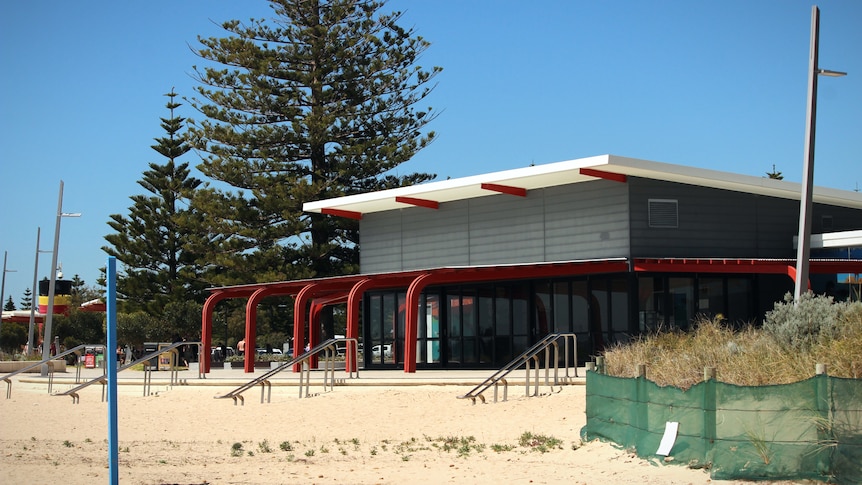 An empty building on a beach front