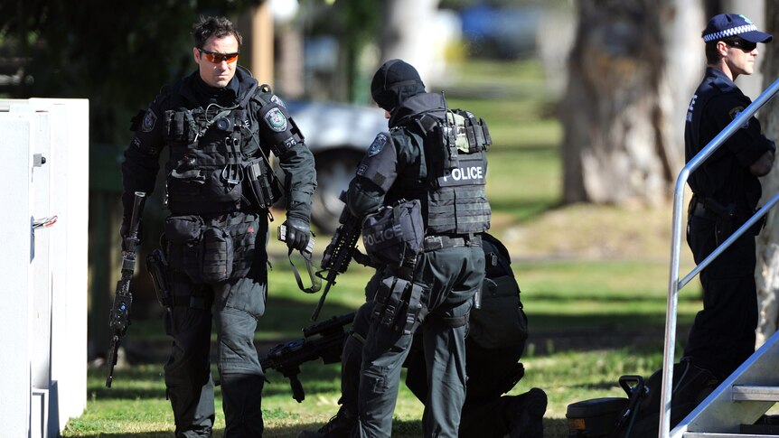 Armed police who stormed a house in Kurnell in southern Sydney