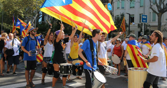 A group of protesters march in support of Catalan independence.