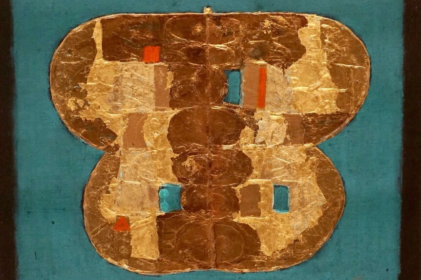 A painting of a gold butterfly