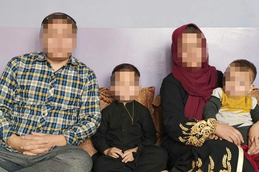 A blurred photo of the Nazari family.