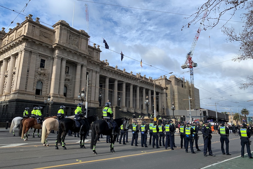 Victoria police at an anti-lockdown protest on Saturday July 24, 2021. 