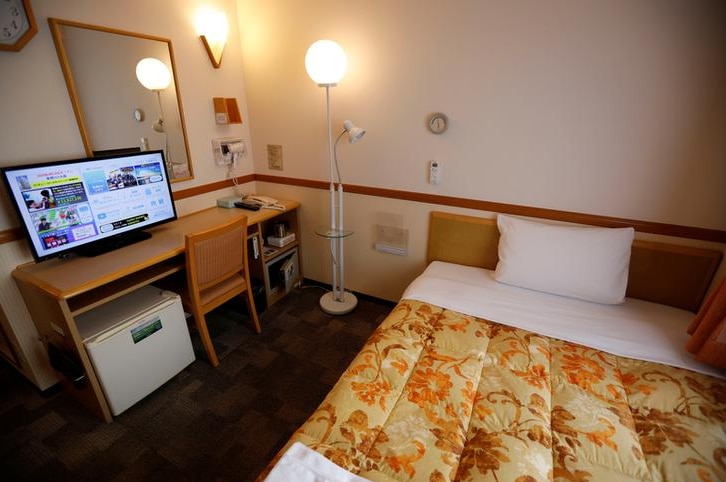 An interior shot of a Japanese hotel room