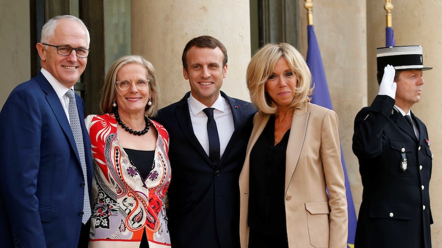 French President Emmanuel Macron and his wife Brigitte welcomed Mr and Mrs Turnbull in Paris.