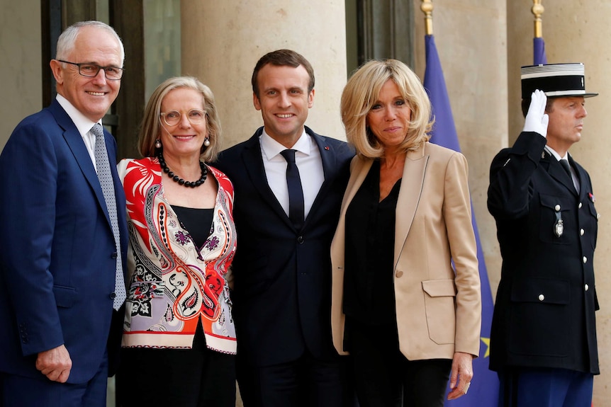 French President Emmanuel Macron and his wife Brigitte welcomed Mr and Mrs Turnbull in Paris.
