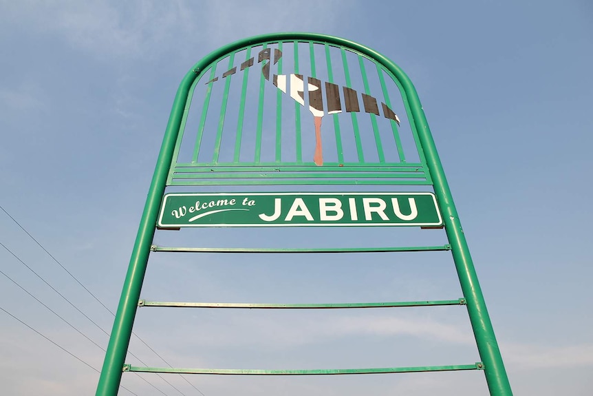 A low angle photo of the Jabiru sign at the entrance to the town.