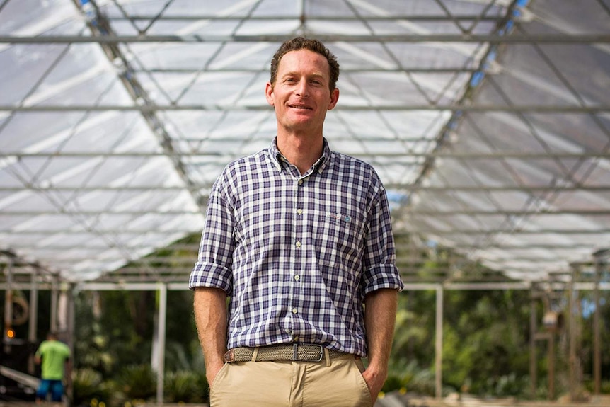 Adam Benjamin stands at the construction site of the growing headquarters of Medifarm in July 2017.