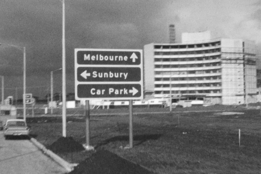 A black and white photo of signs at Melbourne Airport, taken in 1972.