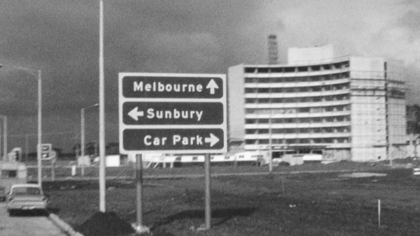 A black and white photo of signs at Melbourne Airport, taken in 1972.