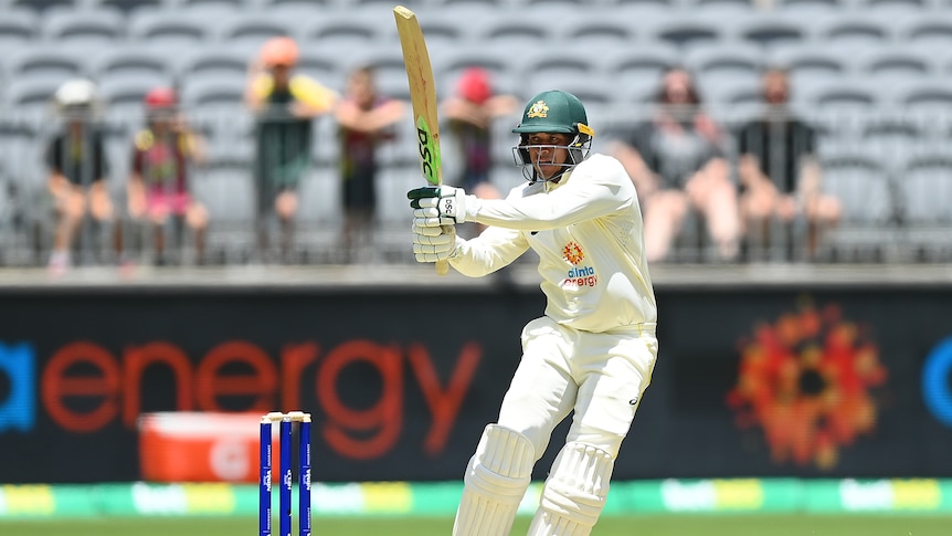 Australia batter Usman Khawaja completes a pull shot on day one of the first Test against West Indies.