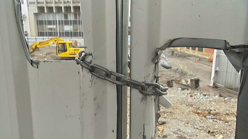 The union believes three workers have been exposed to asbestos at the Parliament Square site.