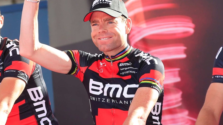Cadel Evans waves to the crowd at the Giro d'Italia