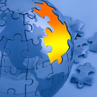 A blue globe jigsaw puzzle with a few pieces missing (Thinkstock: iStockphoto)