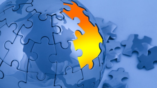 A blue globe jigsaw puzzle with a few pieces missing (Thinkstock: iStockphoto)