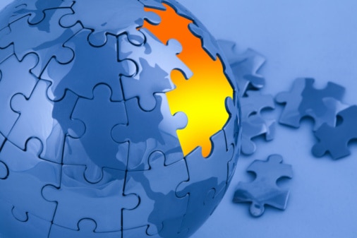 A blue globe jigsaw puzzle with a few pieces missing (Thinkstock: iStockphoto)
