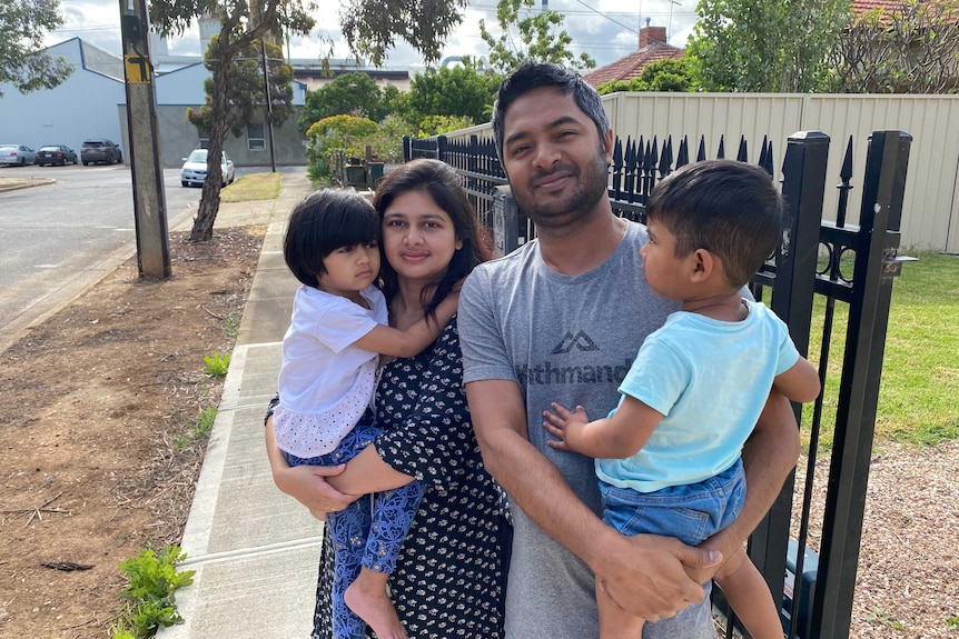 Family outside Kilburn fire