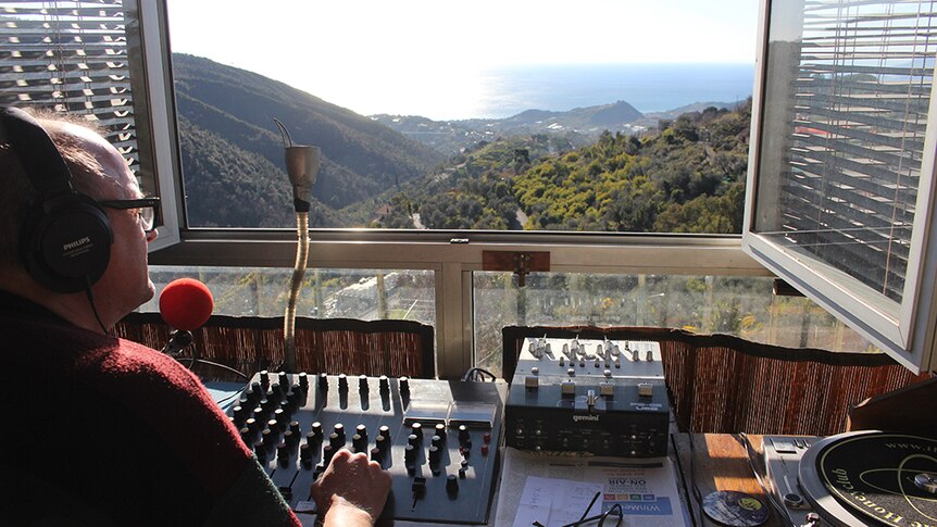 Mark Dezzani broadcasting on Radio Caroline from his studio in Seborga, Italy