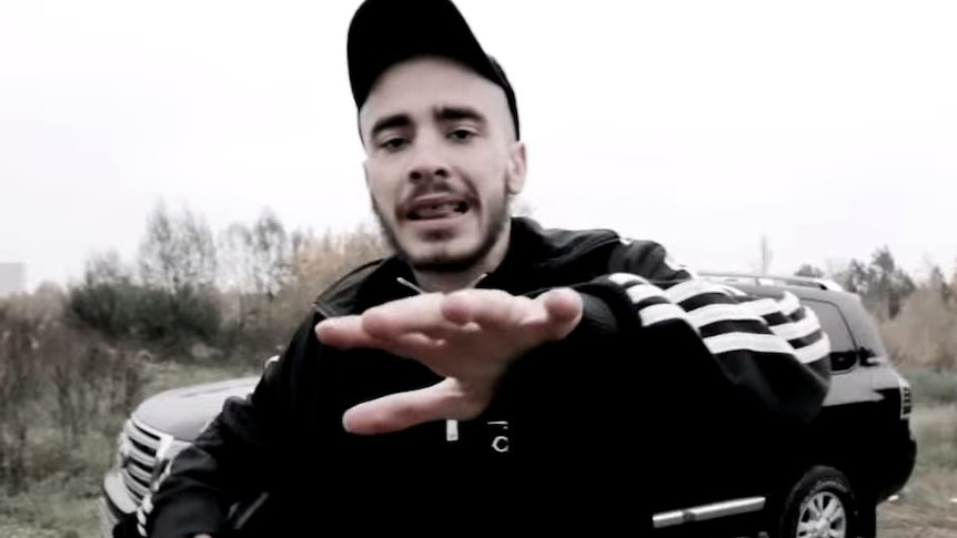 Russian rapper Husky performs in one of his music videos on YouTube.