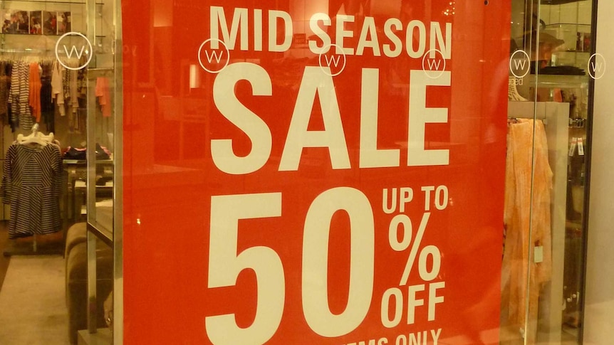 Sale sign in shop window