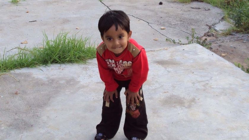 Gurshan Singh poses for a photo on his third birthday.