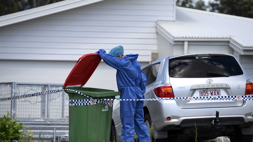 Police forensic officers examine a house in Pimpama on the Gold Coast, Tuesday, Jan. 31, 2017.