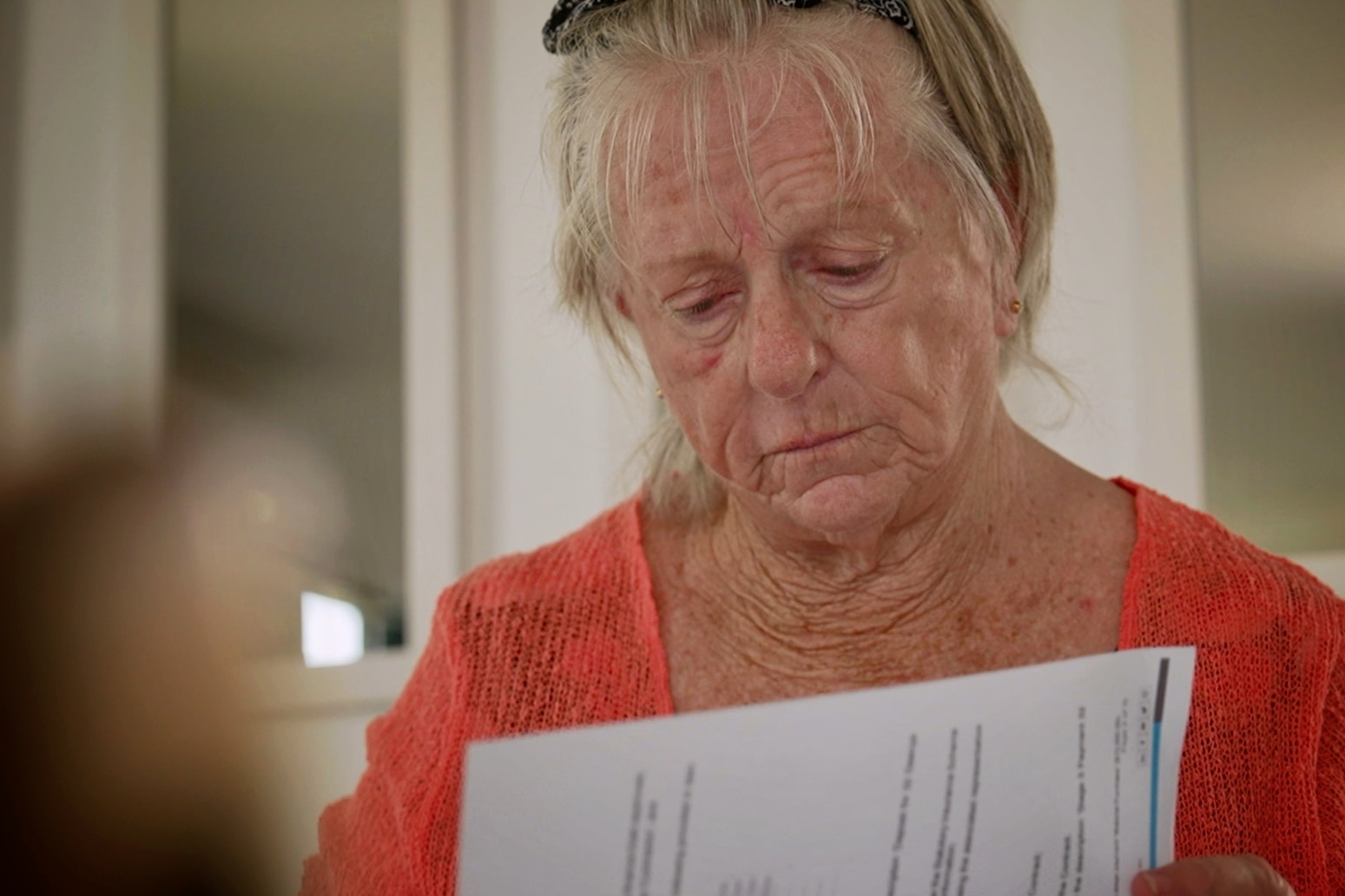 woman looking at documents