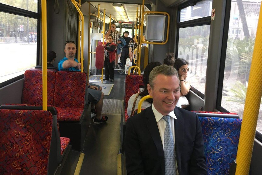 Christopher Pyne travels on a tram in Adelaide