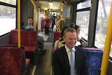 Christopher Pyne travels on a tram in Adelaide