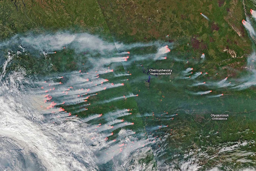 Wildfires are visible in this satellite image over parts of eastern Russia. They are producing a lot of smoke.