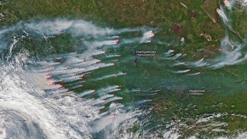 Wildfires are visible in this satellite image over parts of eastern Russia. They are producing a lot of smoke.