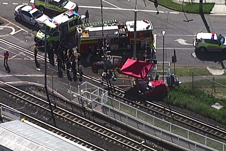 Scene of a fatal train level-crossing accident on the Cleveland line Brisbane, where a woman was killed.
