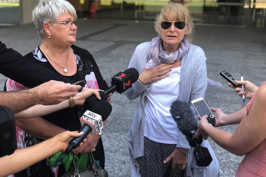 Judy Dent (left) and Lynette Lucas (right) speak to journalists outside the Supreme Court.