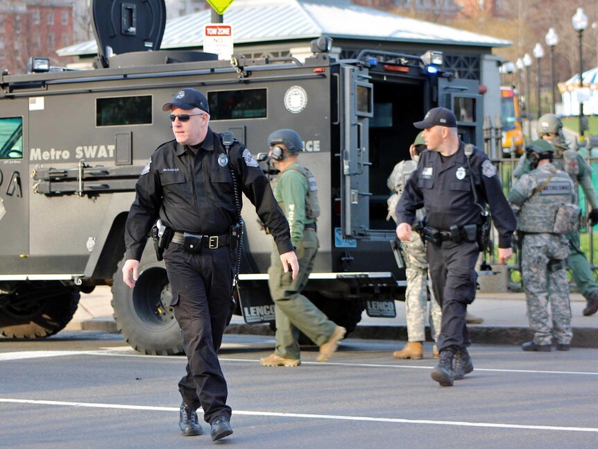 Boston police and Metro SWAT officers at the scene.