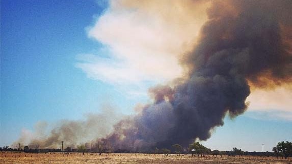 Smoke fills horizon from a bushfire near Harvey