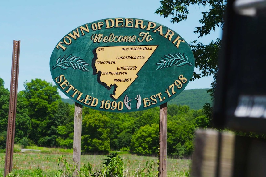 A sign says welcome to Deerpark.