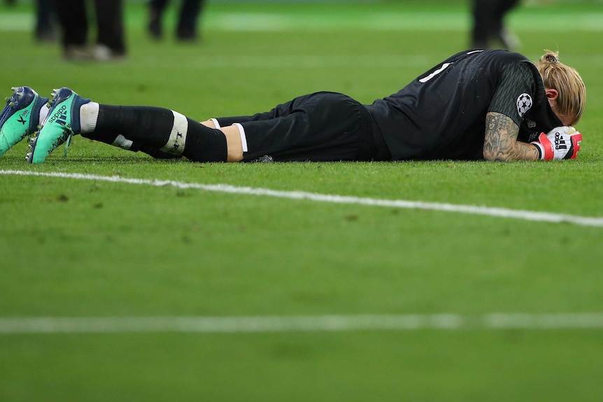 Liverpool's Loris Karius looks dejected at the end of the match