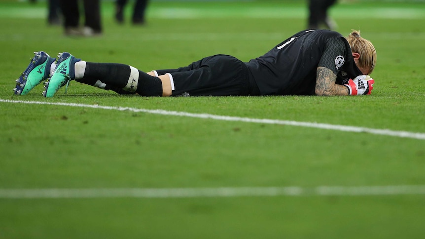 Liverpool's Loris Karius looks dejected at the end of the match