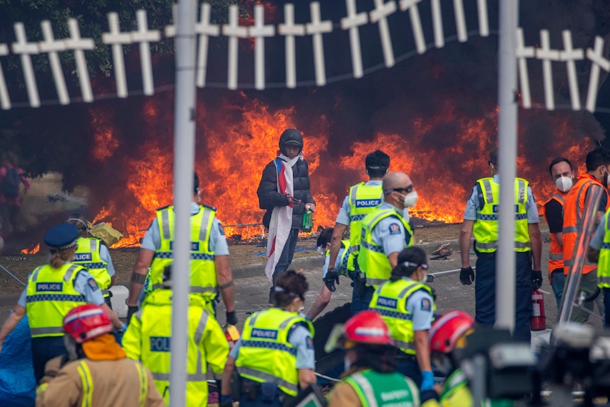 Demonstrators set fire to tents, mattresses and chairs 