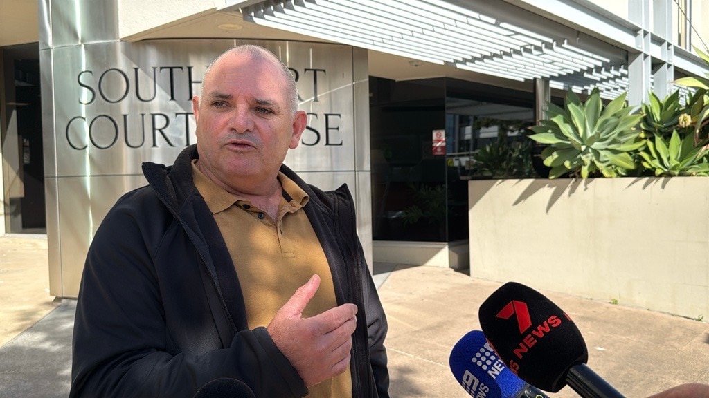 Man speaks outside of Southport Courthouse