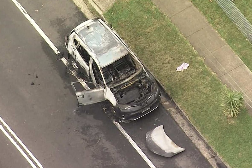 Aerial view of a burnt out car