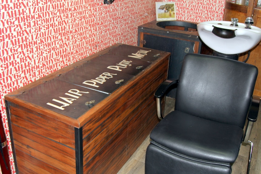 Recycling waste station inside hair salon.