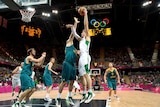 Too good ... Brazil's Tiago Splitter shoots over Australian forward Aleks Maric.