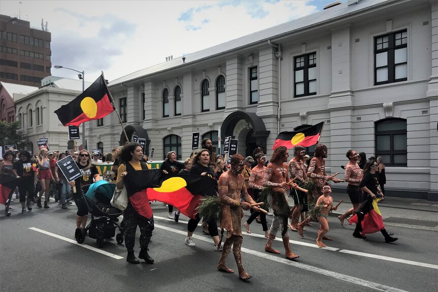 Protesters in an Invasion Day rally in Hobart.
