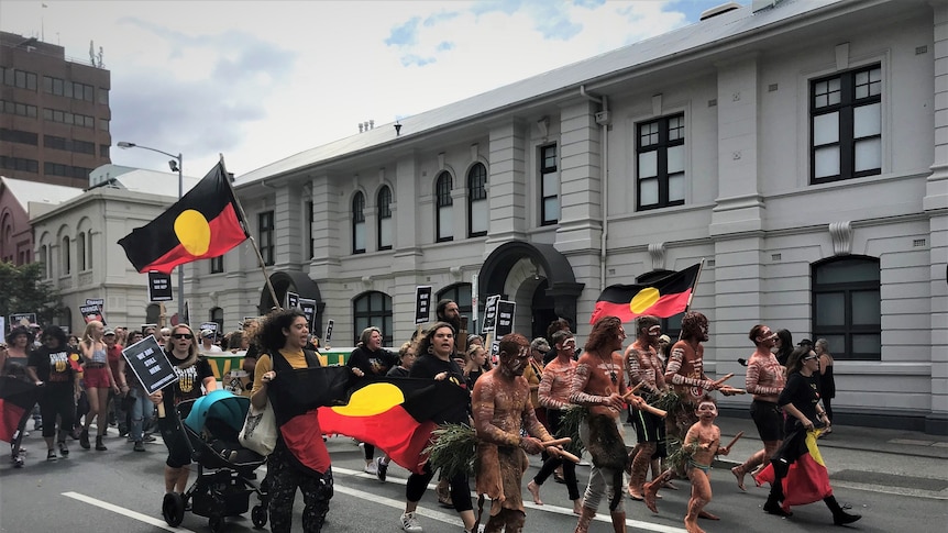 Protesters in an Invasion Day rally in Hobart.