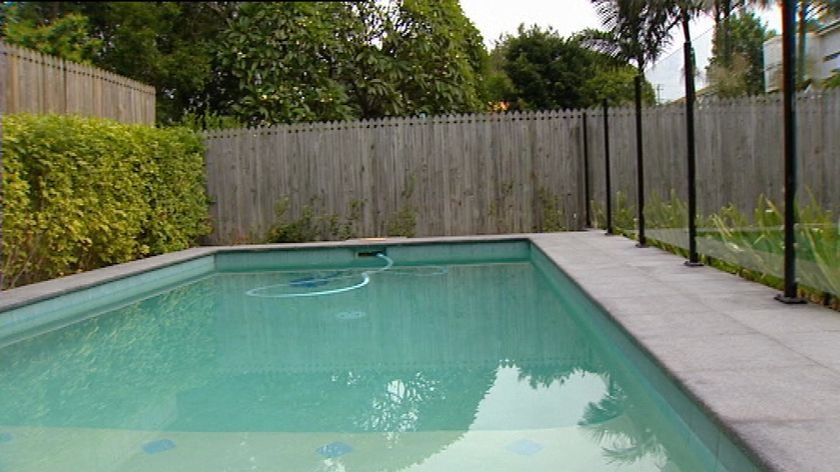 Pool with glass fence. (ABC TV News)