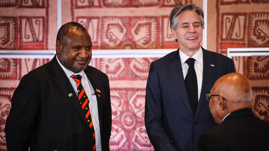 PNG PM James Marape stands beside US Secretary of State Antony Blinken after a formal meeting.