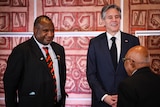 PNG PM James Marape stands beside US Secretary of State Antony Blinken after a formal meeting.