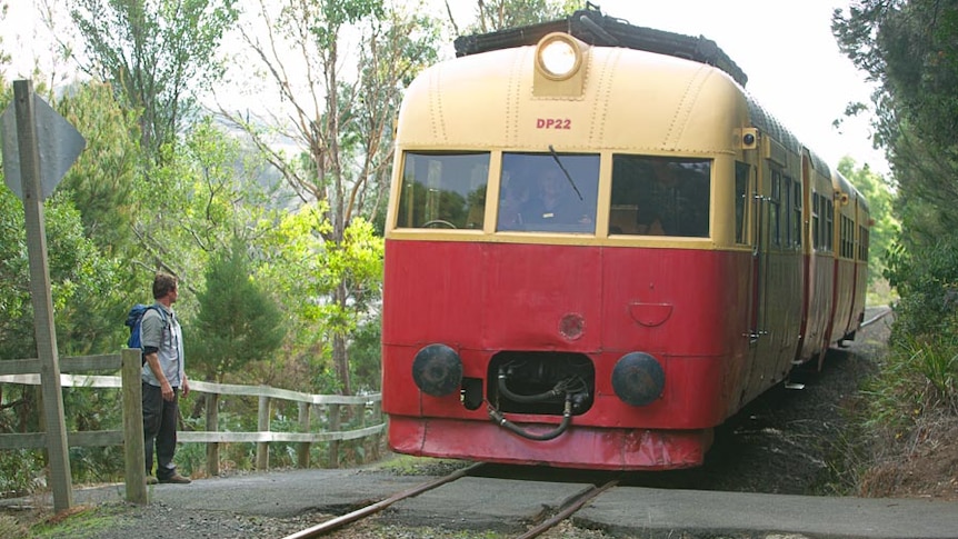 Tasman Limited rail car tracking along the Don River
