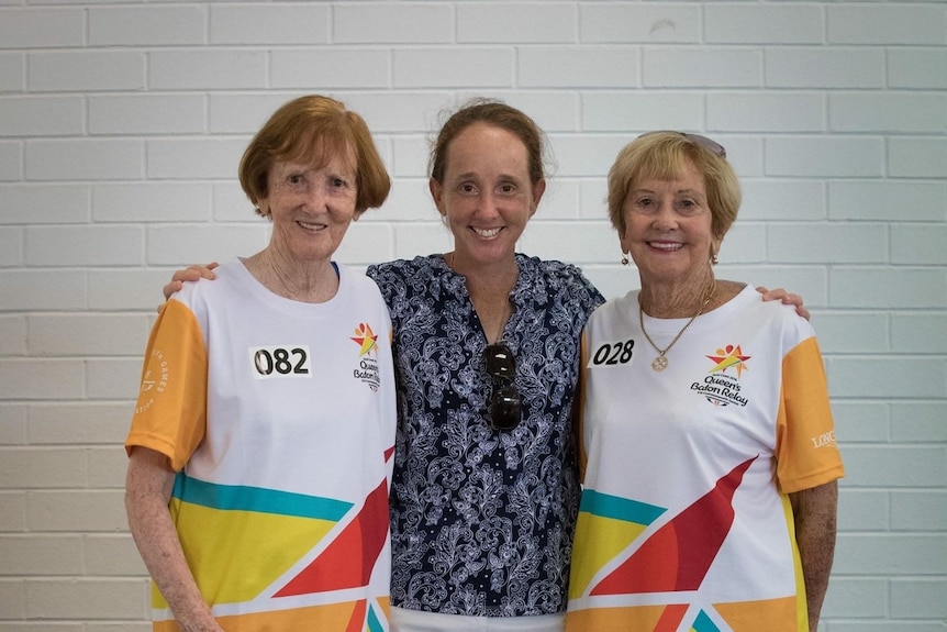 Daph posing with her sister and niece.