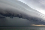 GENERIC storm front moving across an open body of water